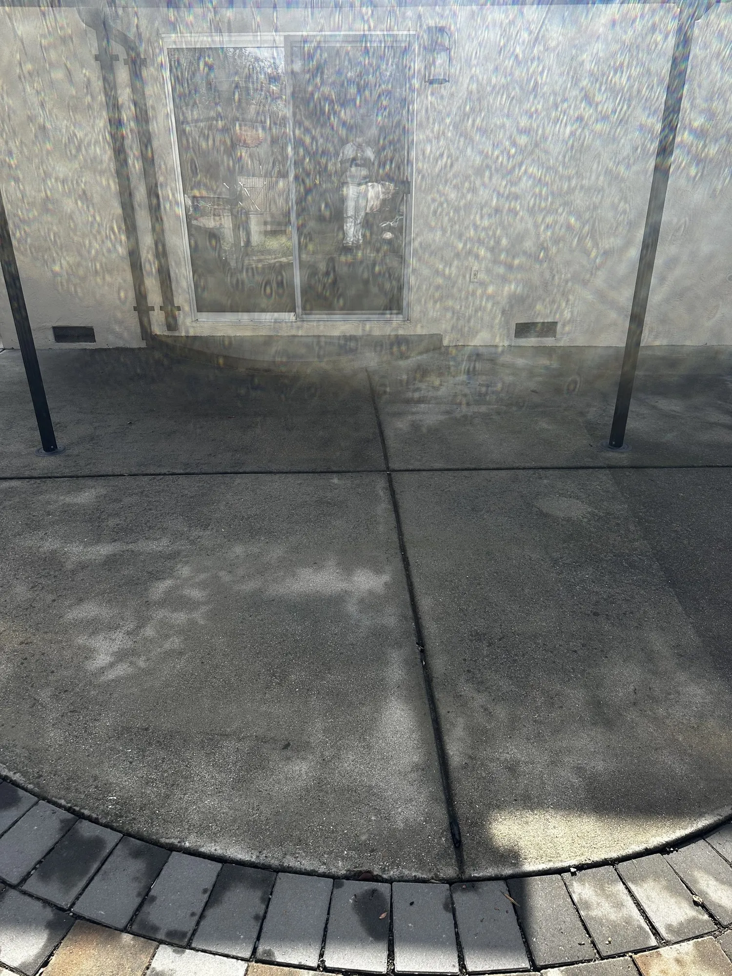 Grimed-in concrete patio — before